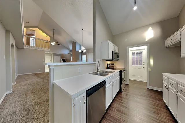 a view of house with backyard of the house