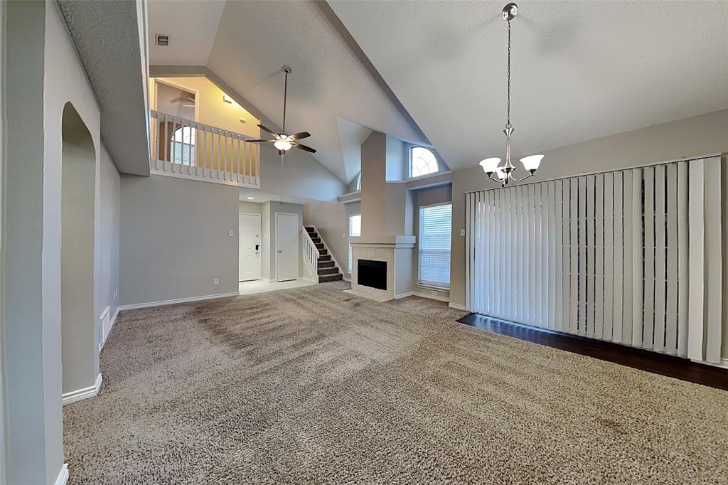 1213 Broken Arrow Trail Carrollton, TX 75007 - Photo 4 of 19 a view of a kitchen with a sink and a chandelier