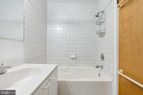 a bathroom with a sink and a bathtub