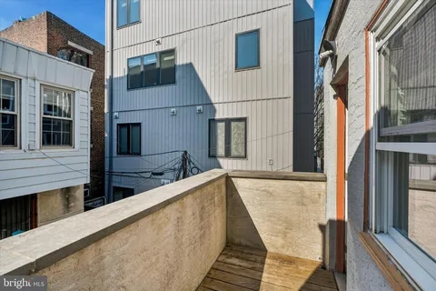 a view of a house with a door and a window