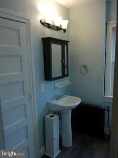 a bathroom with a glass door