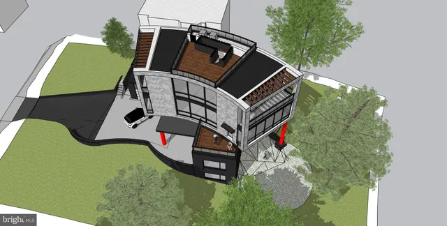 a view of a backyard with a large tree