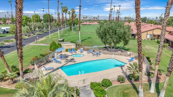 a view of a swimming pool and outdoor space