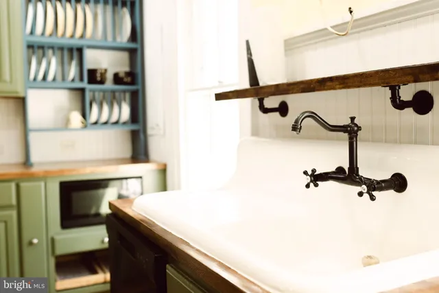 a bathroom with a bathtub and shower