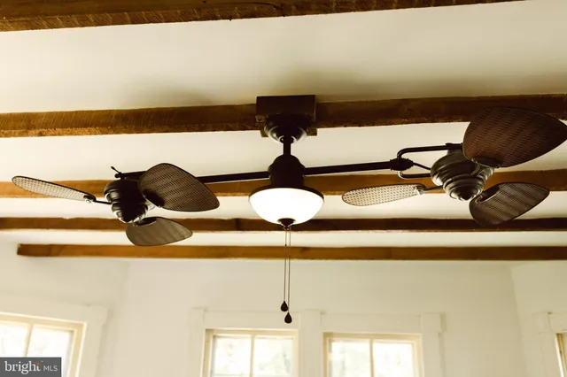a vase of flowers sitting on a table