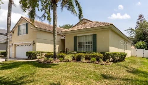 65 Calliope Street Ocoee, FL 34761 - Photo 6 of 60 a front view of a house