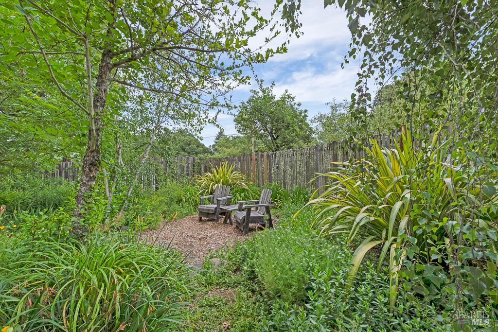 4542 Thomas Road Sebastopol, CA 95472 - Photo 45 of 60 a view of a bench in a garden