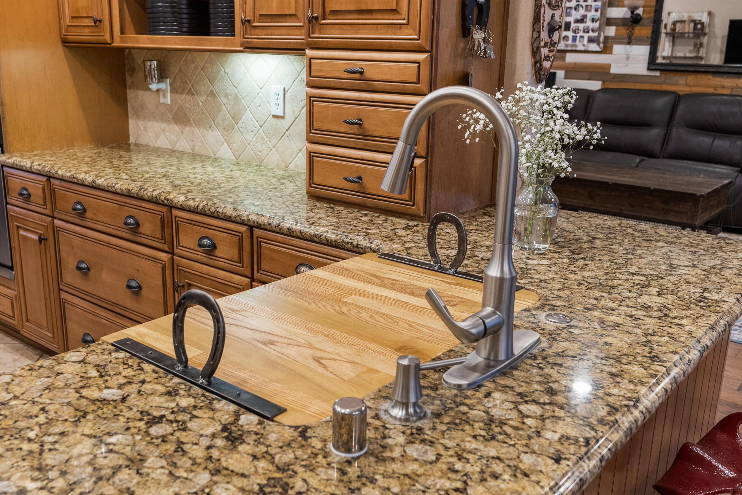 4114 9th Street Acton, CA 93510 - Photo 12 of 63 a bathroom with a granite countertop sink a mirror and shower