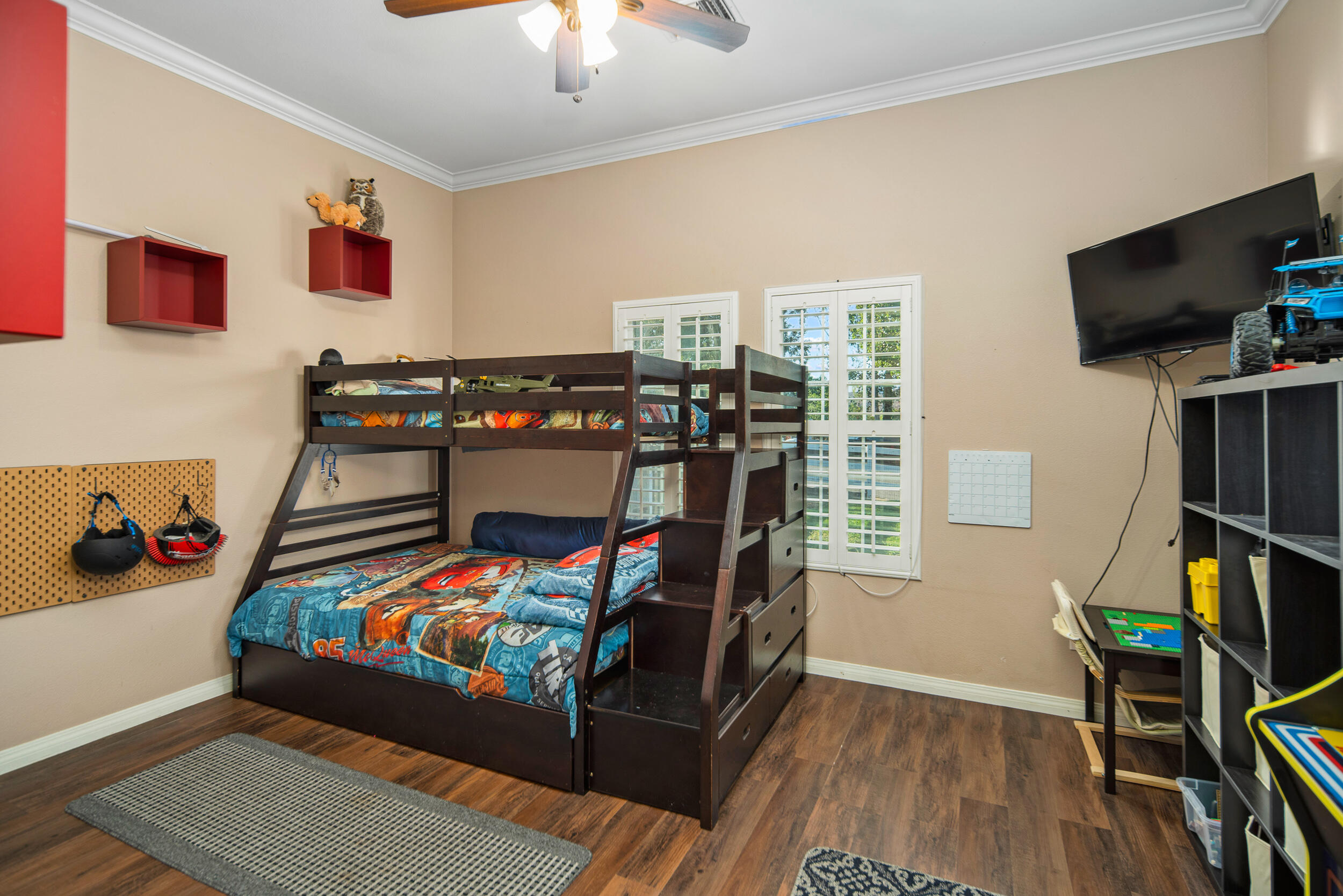 4114 9th Street Acton, CA 93510 - Photo 24 of 63 a children room with furniture and a flat screen tv