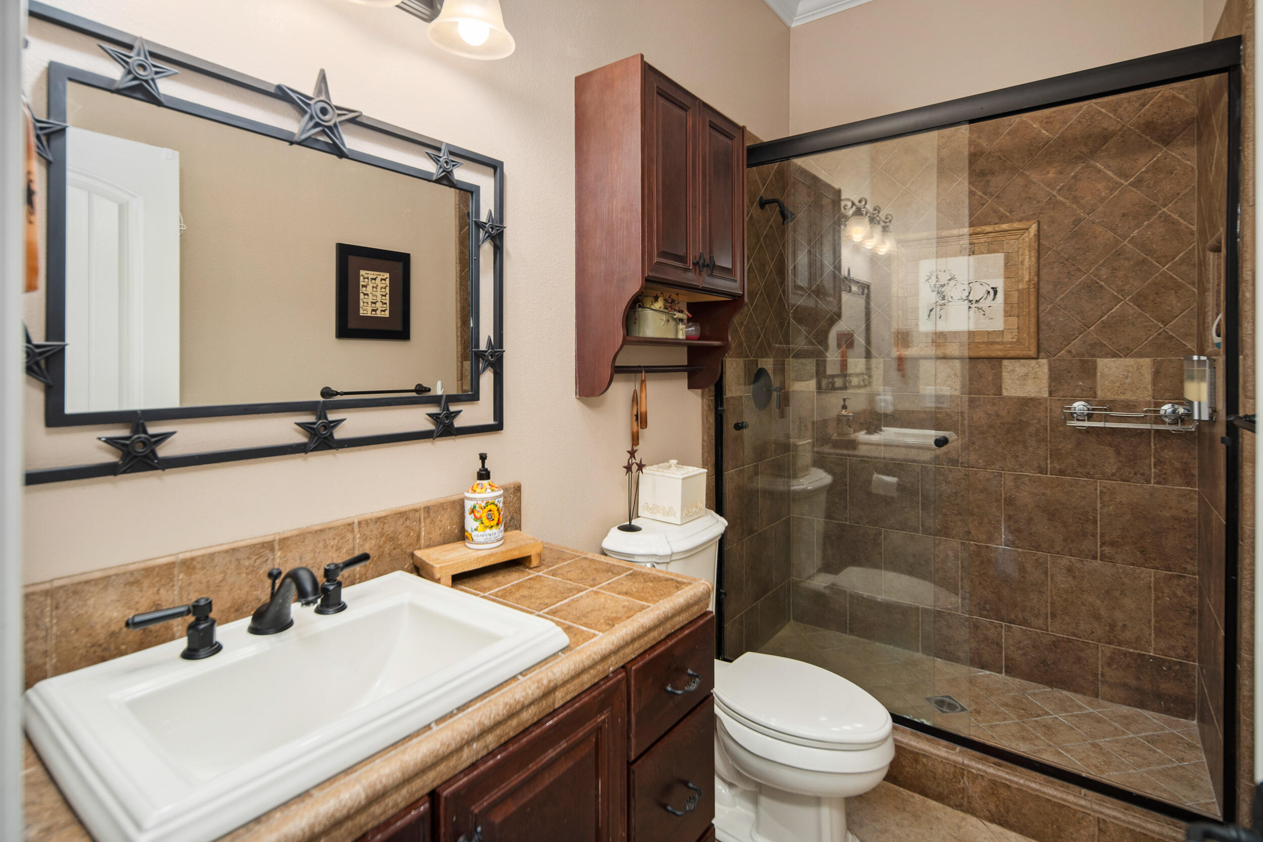 4114 9th Street Acton, CA 93510 - Photo 27 of 63 a bathroom with a sink toilet tub and shower