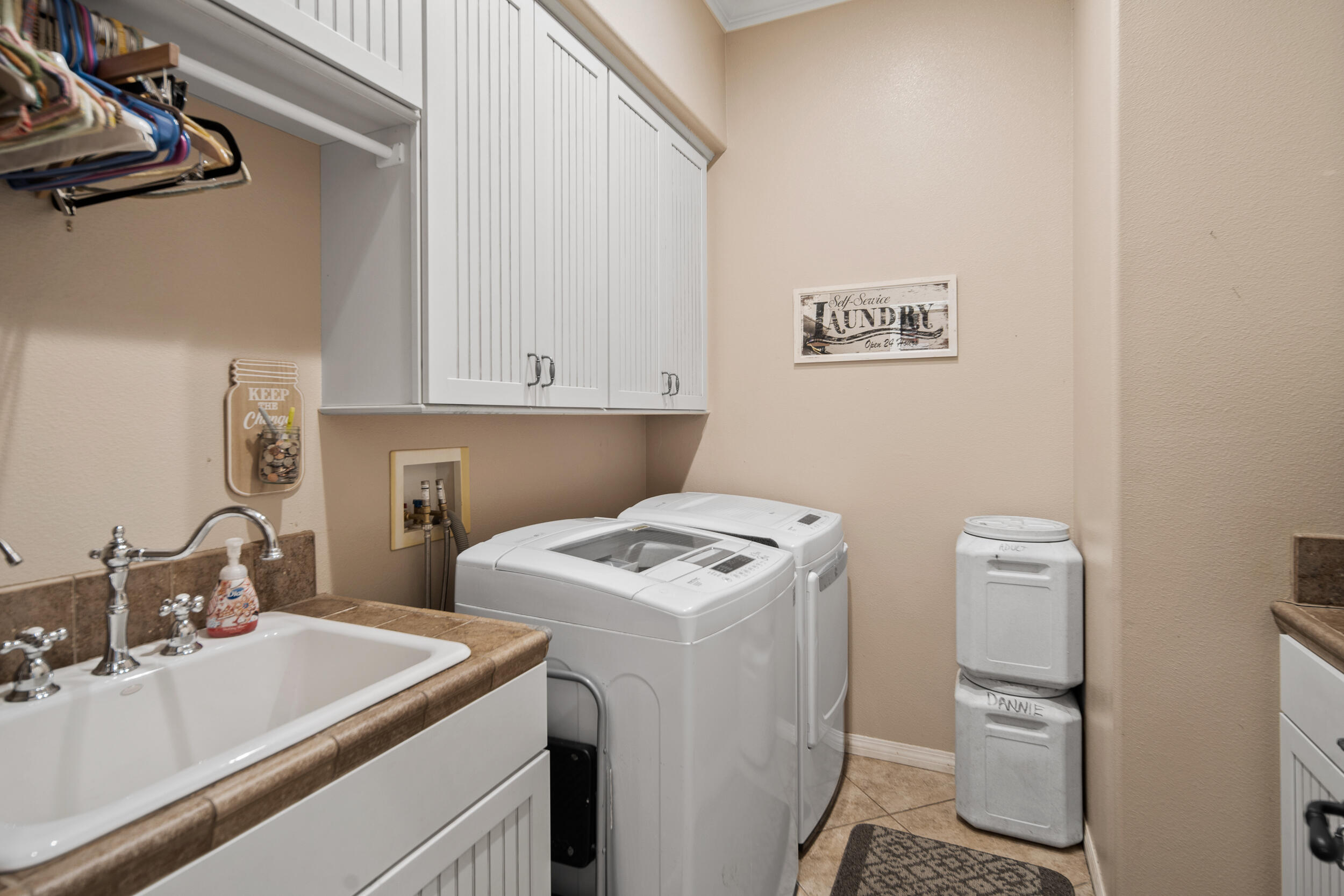 4114 9th Street Acton, CA 93510 - Photo 28 of 63 a utility room with sink dryer and washer