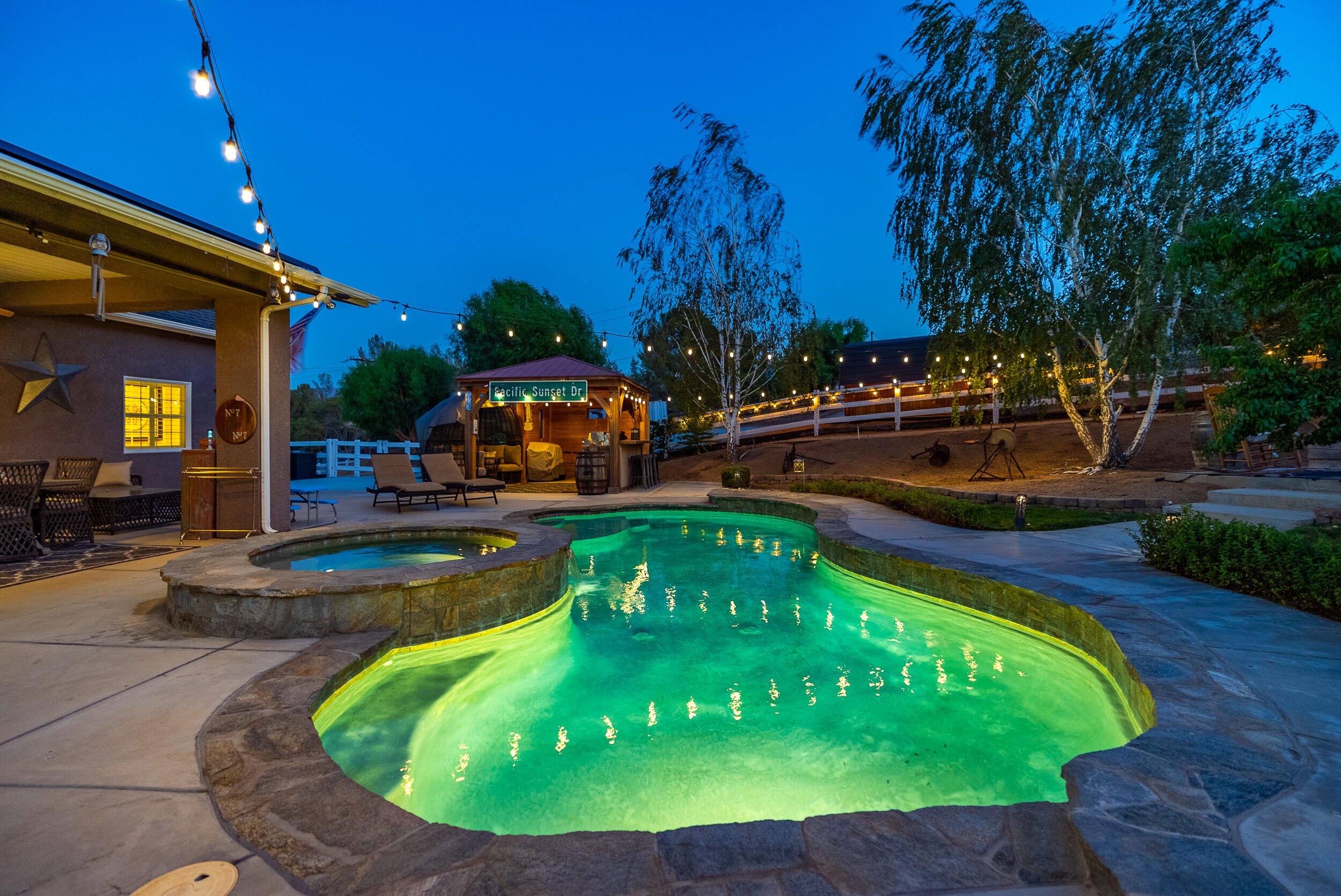 4114 9th Street Acton, CA 93510 - Photo 36 of 63 a view of a swimming pool with a yard