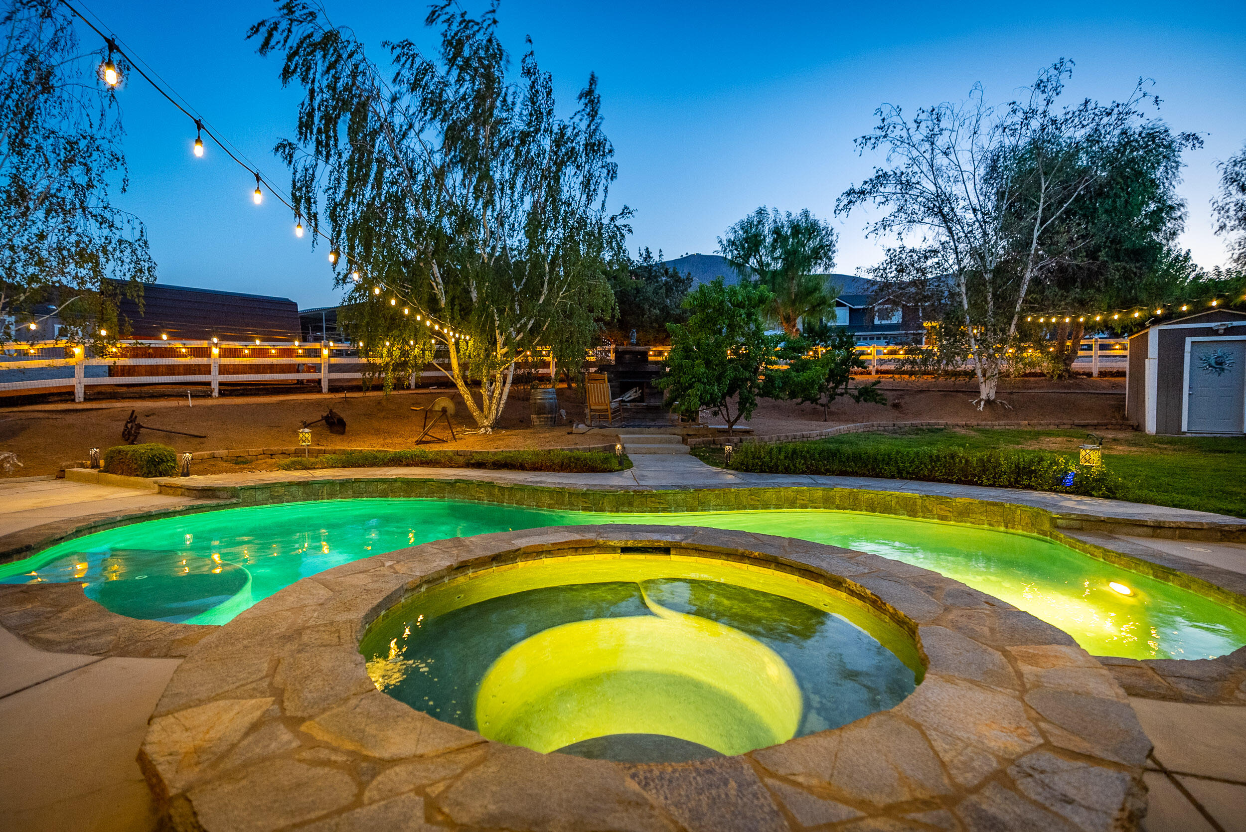 4114 9th Street Acton, CA 93510 - Photo 37 of 63 a swimming pool with outdoor seating and yard