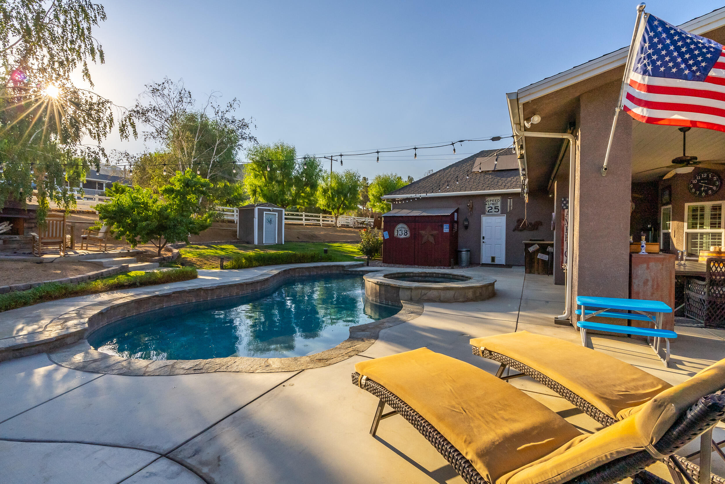4114 9th Street Acton, CA 93510 - Photo 43 of 63 a swimming pool with outdoor seating yard and barbeque oven