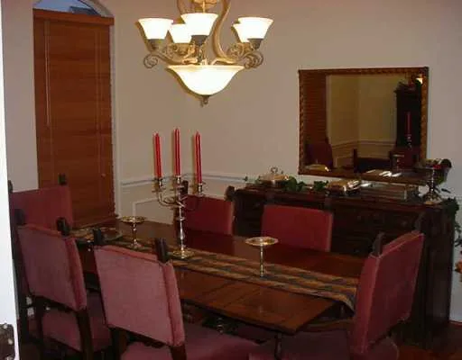 a room with chairs and a flat screen tv