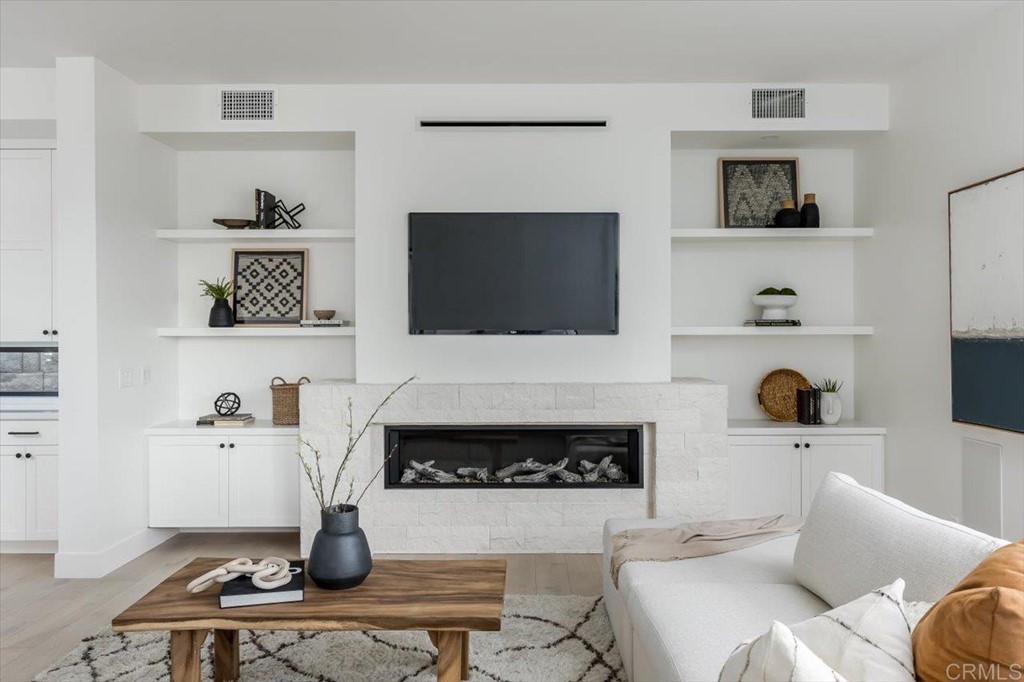 2942 Lone Jack Road Encinitas, CA 92024 - Photo 12 of 23 a living room with furniture and a flat screen tv