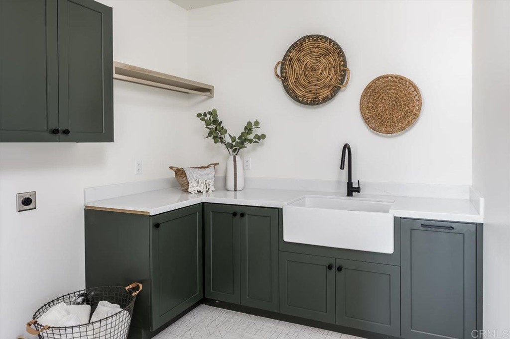 2942 Lone Jack Road Encinitas, CA 92024 - Photo 19 of 23 a bathroom with a sink and a mirror