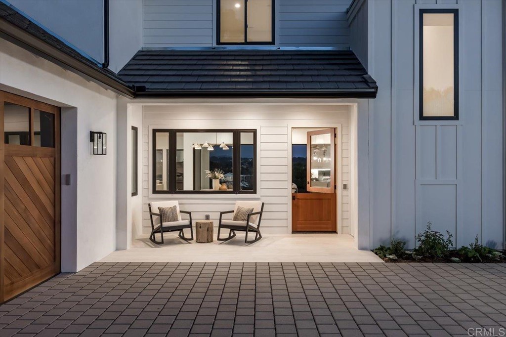 2942 Lone Jack Road Encinitas, CA 92024 - Photo 2 of 23 a view of a room with wooden floor and windows