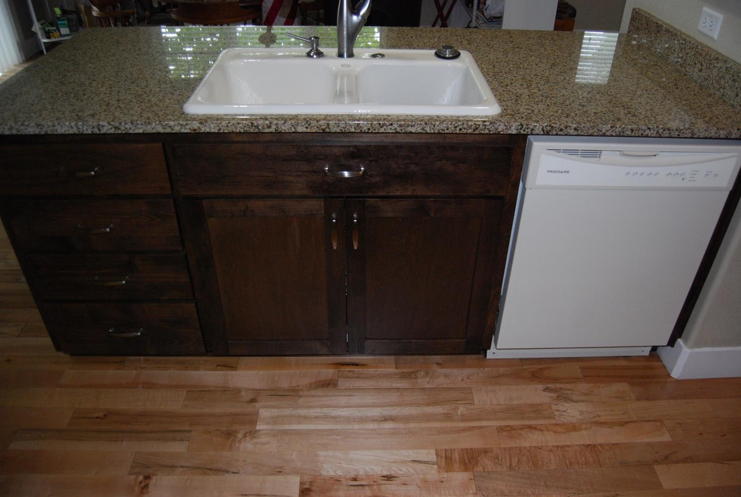 1171 North Haskell Street Central Point, OR 97502 - Photo 9 of 19 a bathroom with a granite countertop sink and a mirror