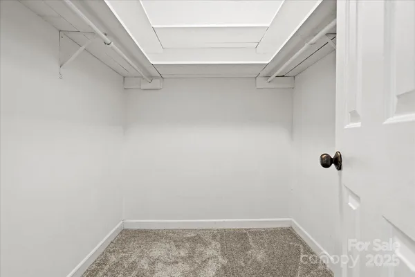 a view of a room with racks on the wall