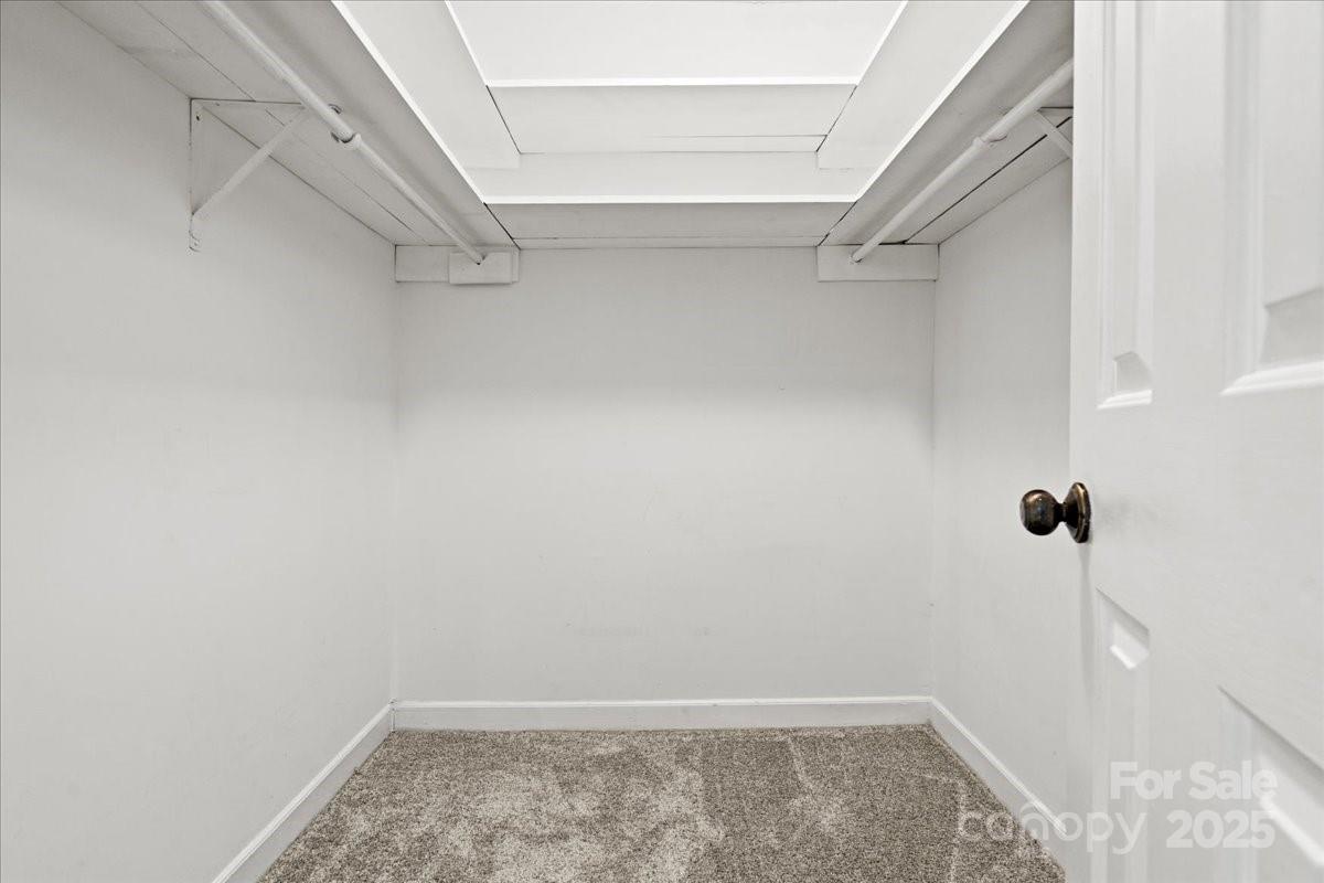 305 Virginia Avenue Cheraw, SC 29520 - Photo 11 of 48 a view of a room with racks on the wall