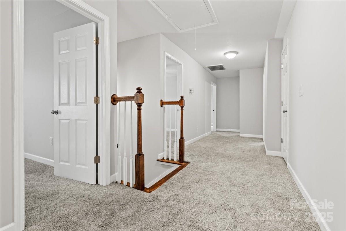 305 Virginia Avenue Cheraw, SC 29520 - Photo 31 of 48 an empty room with windows
