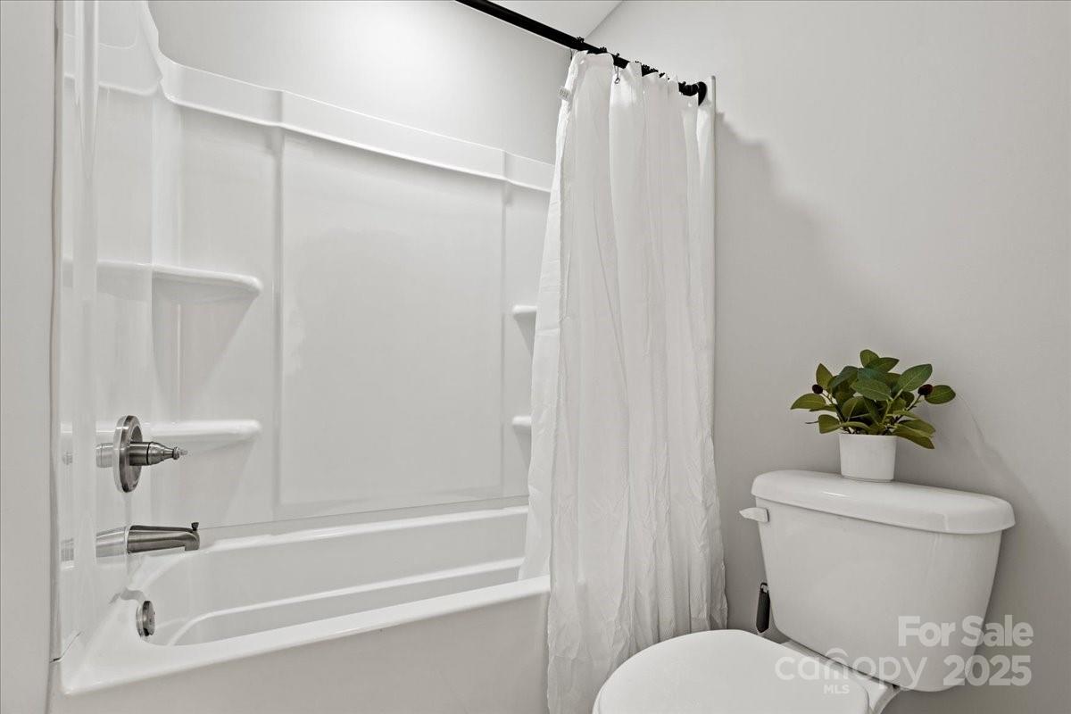 305 Virginia Avenue Cheraw, SC 29520 - Photo 36 of 48 a bathroom with a sink toilet and shower
