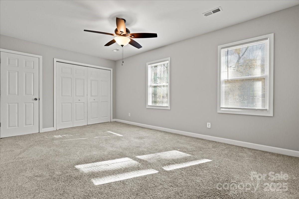 305 Virginia Avenue Cheraw, SC 29520 - Photo 37 of 48 a view of an empty room with a window