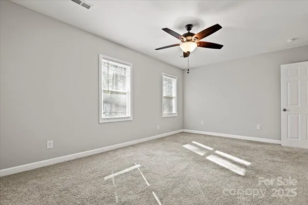 a view of workspace with window and ceiling fan
