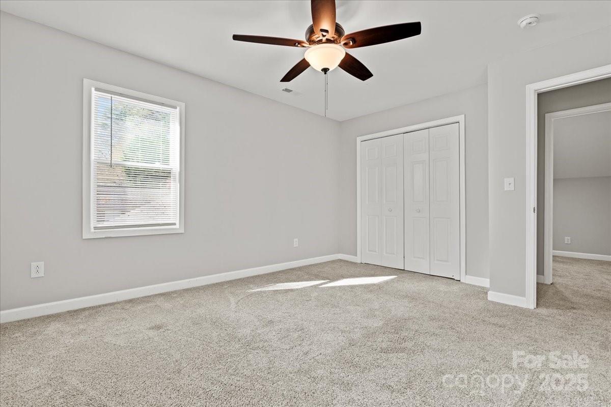 305 Virginia Avenue Cheraw, SC 29520 - Photo 45 of 48 a view of an empty room with a window