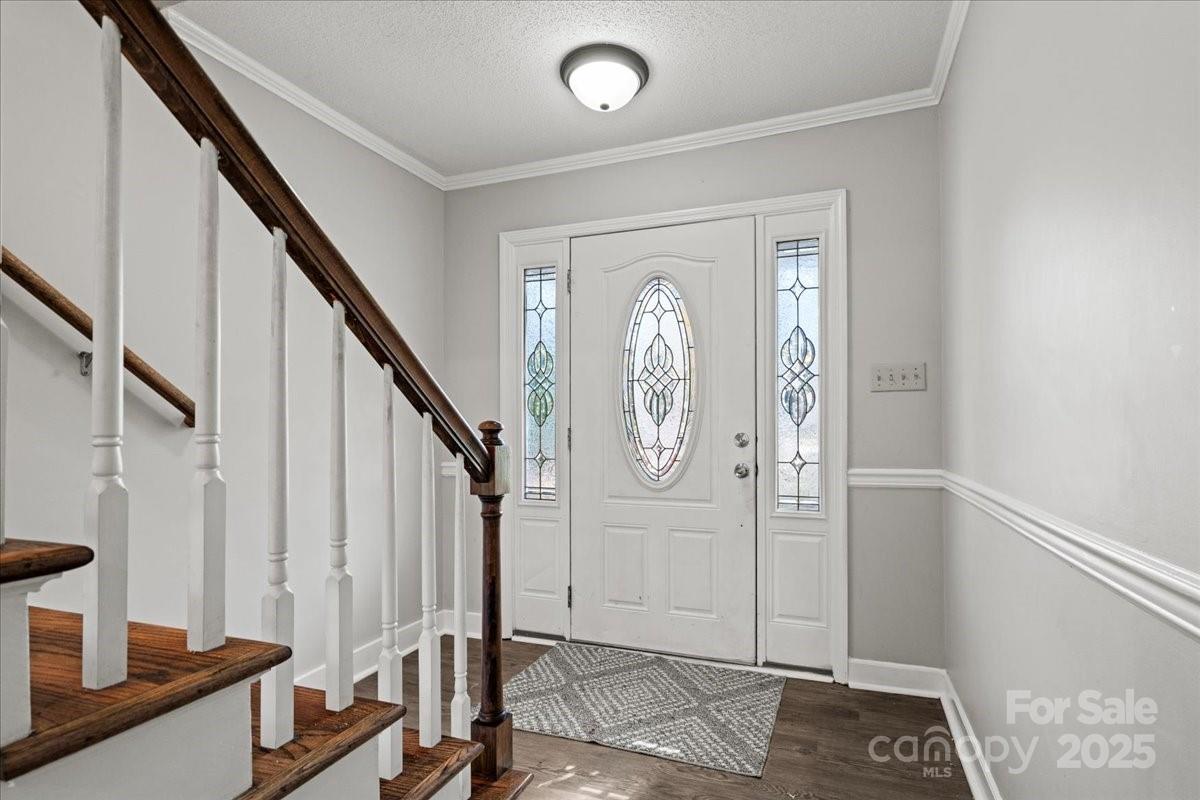 305 Virginia Avenue Cheraw, SC 29520 - Photo 6 of 48 a view of entryway with wooden floor