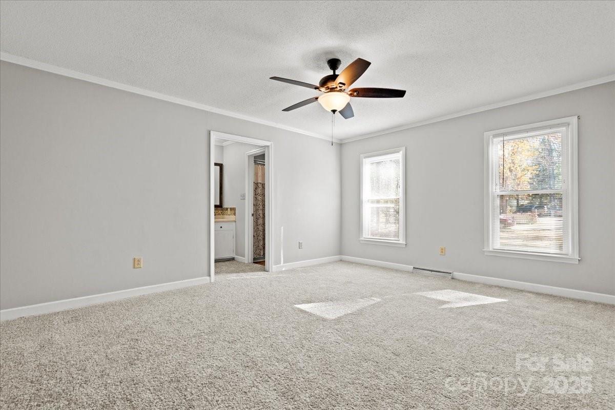 305 Virginia Avenue Cheraw, SC 29520 - Photo 8 of 48 a view of an empty room with a window