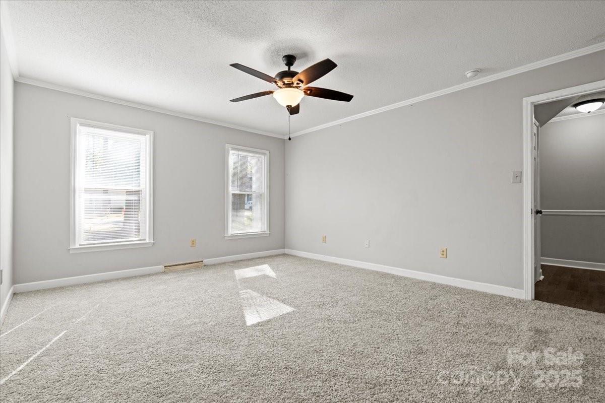 305 Virginia Avenue Cheraw, SC 29520 - Photo 9 of 48 a view of an empty room with a window