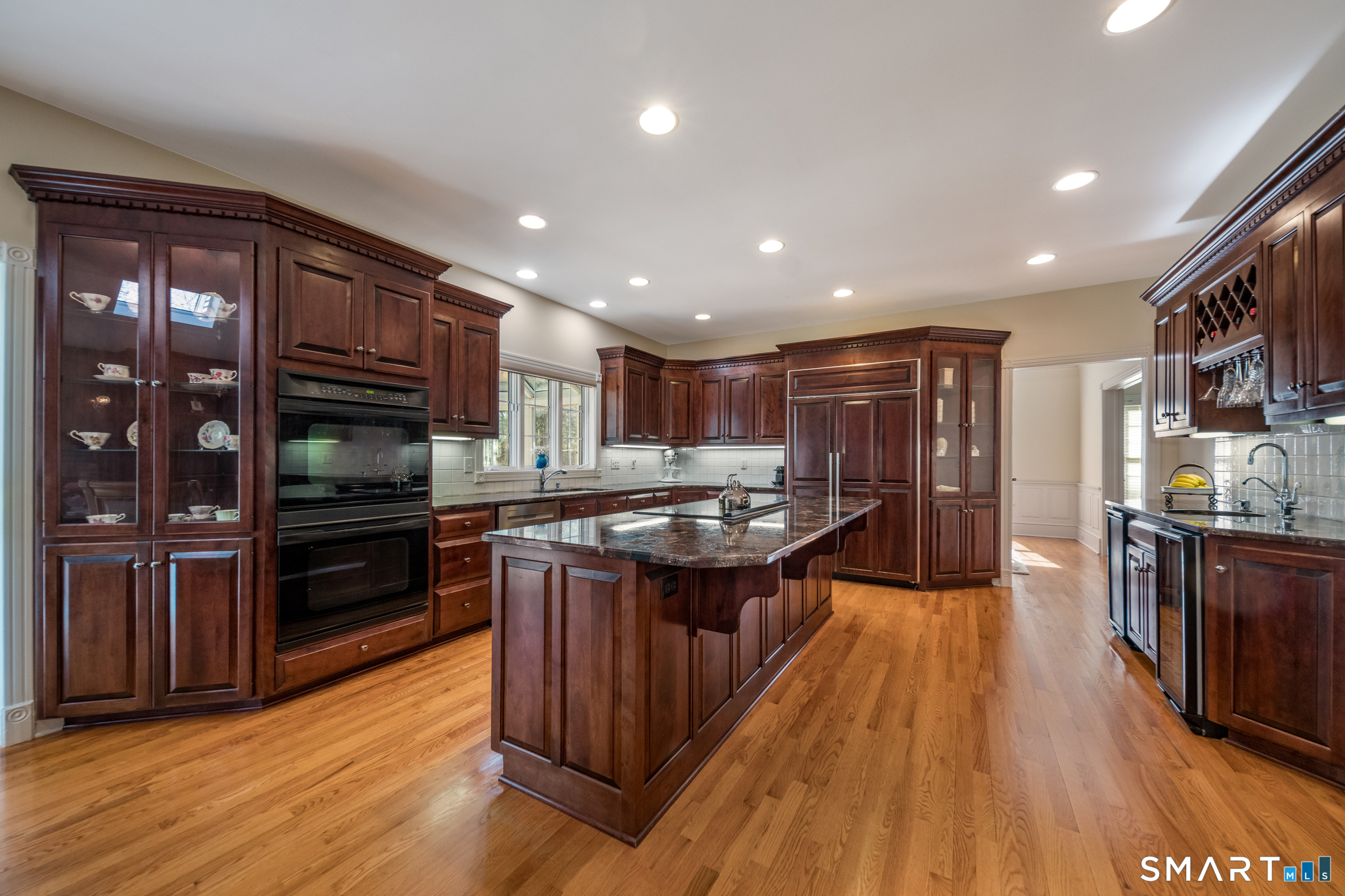 11 Kachina Way Madison, CT 06443 - Photo 11 of 40 a kitchen with stainless steel appliances granite countertop a stove and a refrigerator