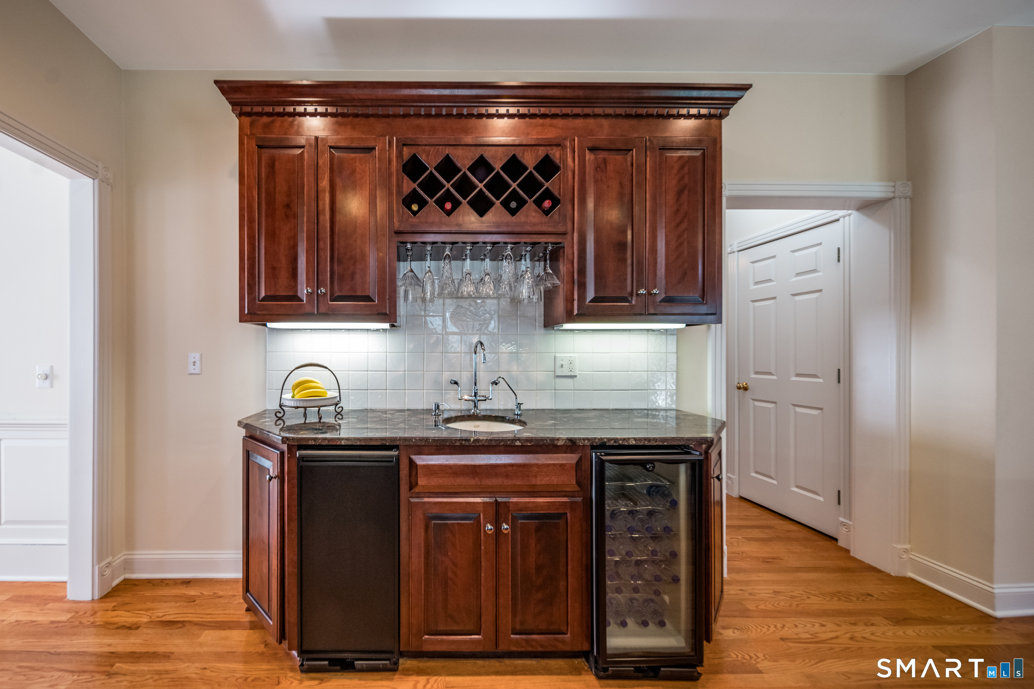11 Kachina Way Madison, CT 06443 - Photo 13 of 40 a kitchen with stainless steel appliances granite countertop a stove and a wooden cabinets