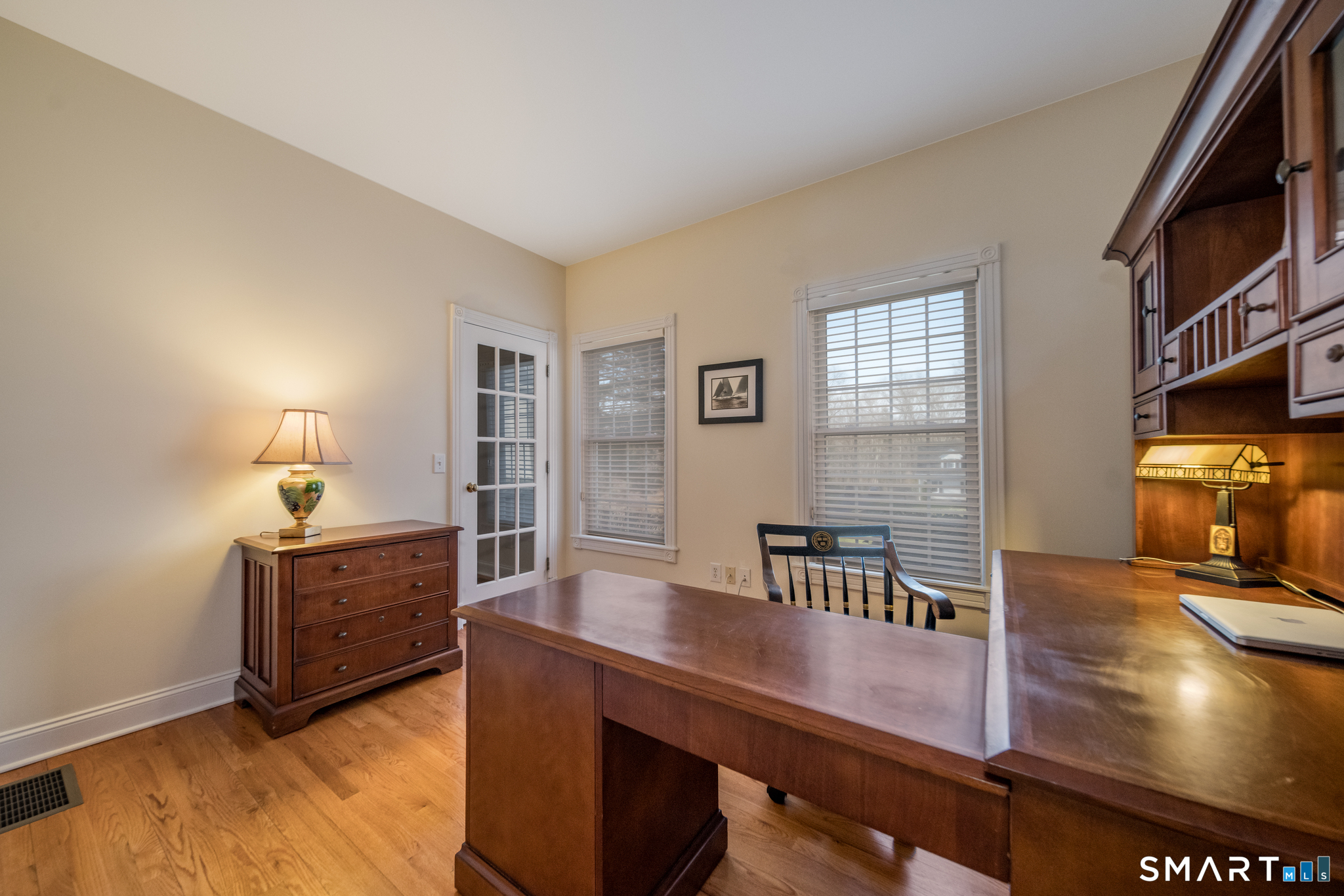 11 Kachina Way Madison, CT 06443 - Photo 22 of 40 a view of a workspace with furniture and a dresser