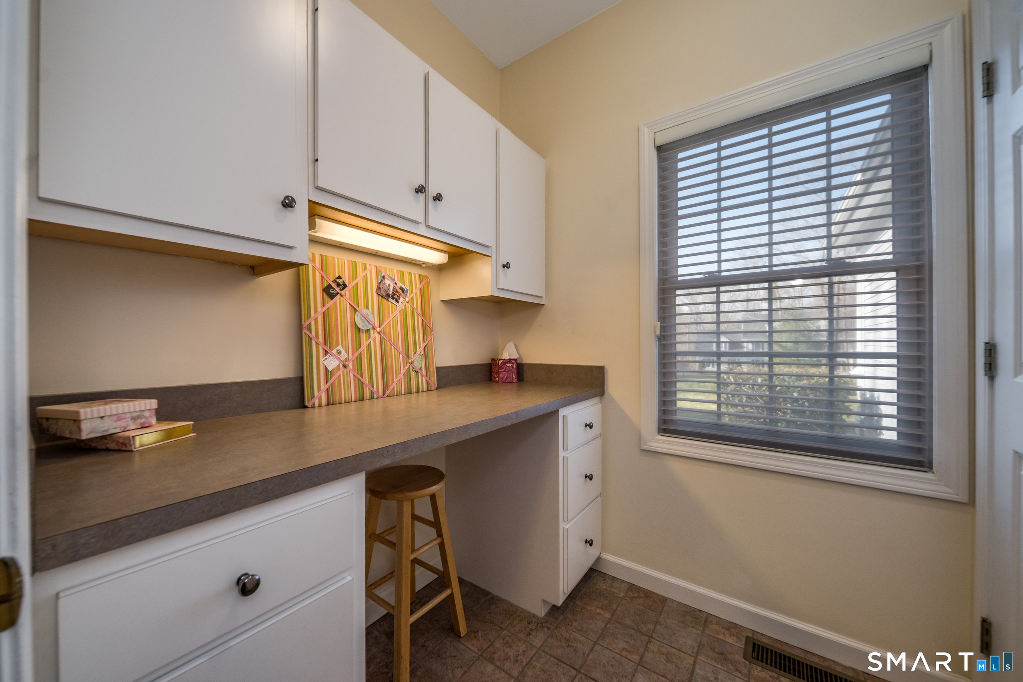 11 Kachina Way Madison, CT 06443 - Photo 23 of 40 a kitchen with stainless steel appliances a sink a stove and white cabinets