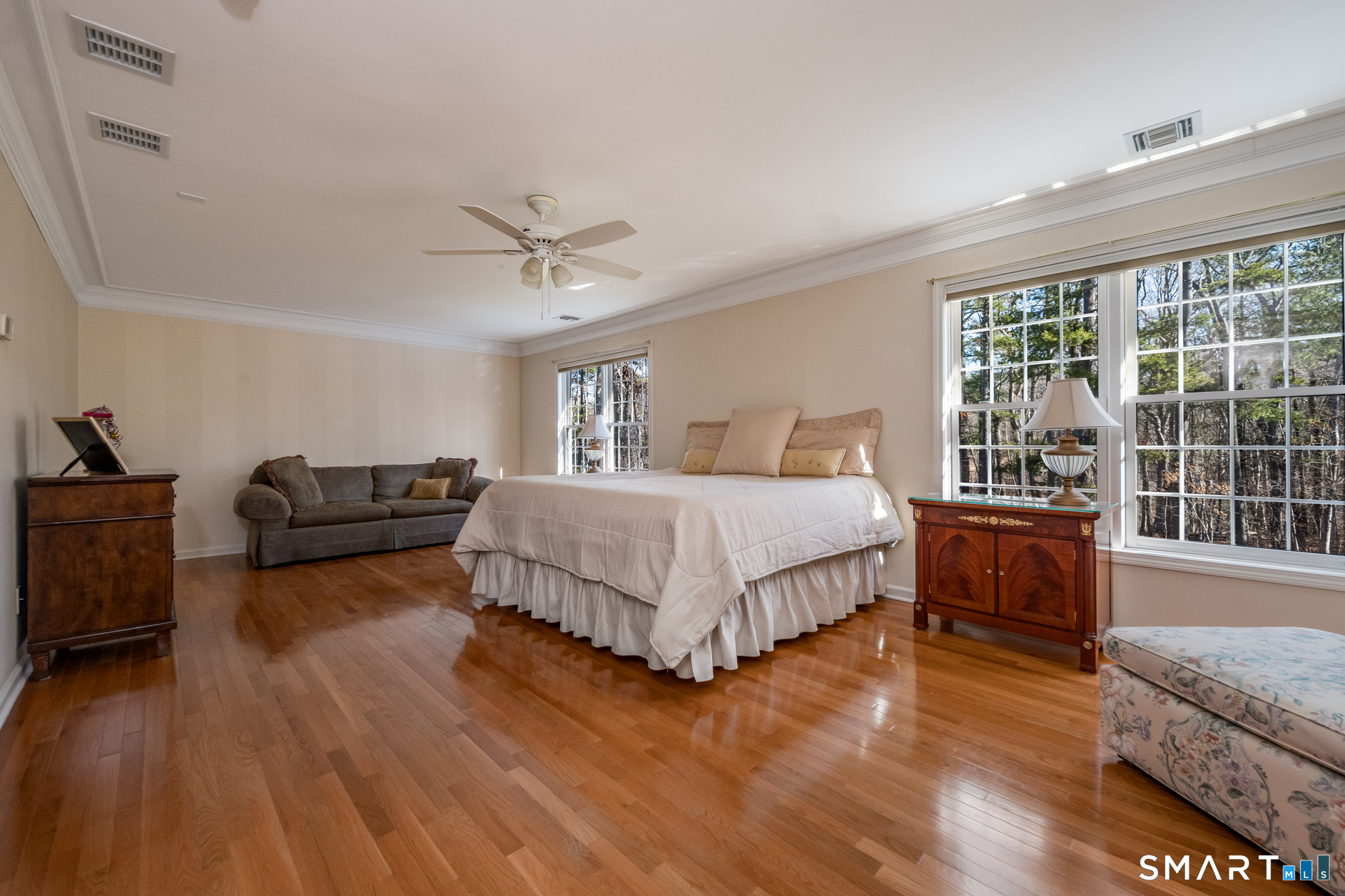 11 Kachina Way Madison, CT 06443 - Photo 29 of 40 a spacious bedroom with a bed and wooden floor