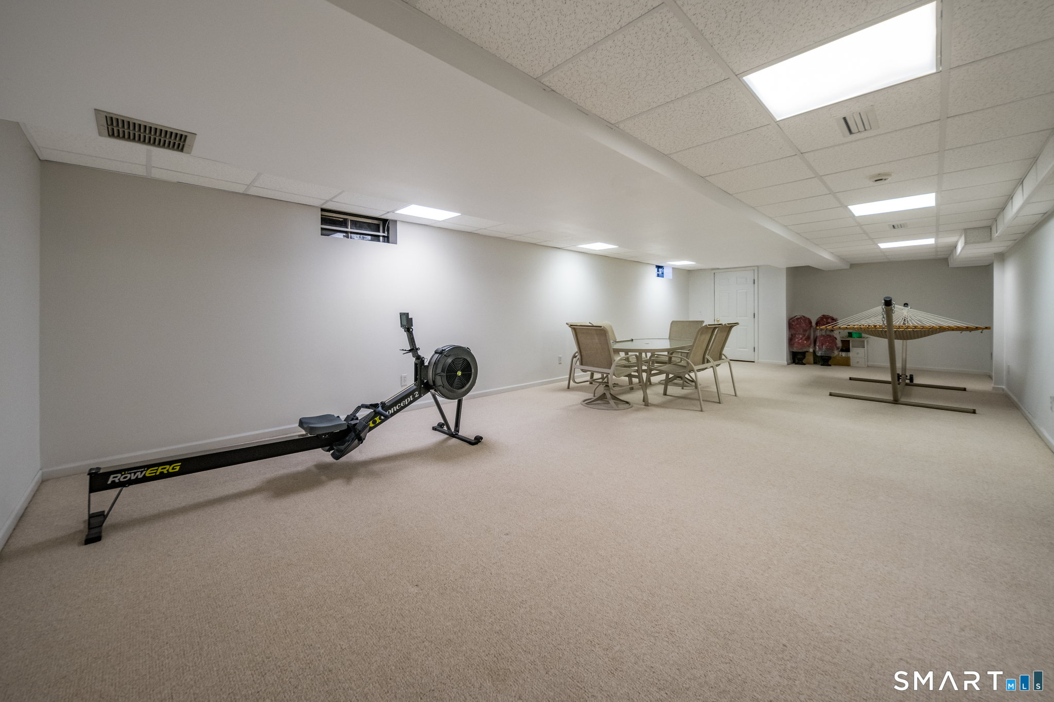 11 Kachina Way Madison, CT 06443 - Photo 34 of 40 a view of a room with gym equipment
