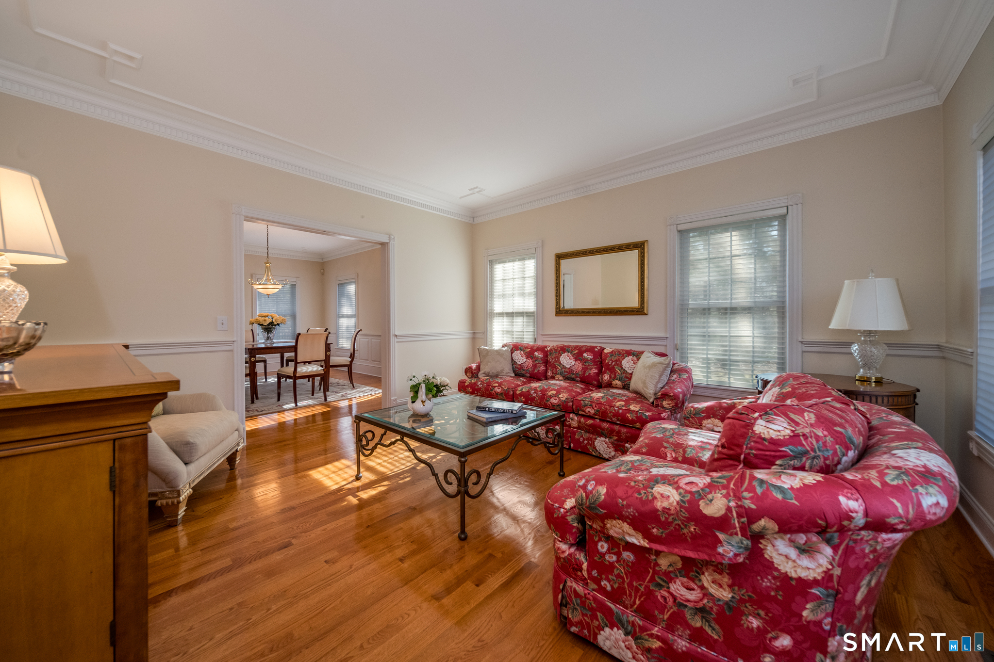 11 Kachina Way Madison, CT 06443 - Photo 7 of 40 a living room with lots of furniture and painting on the wall