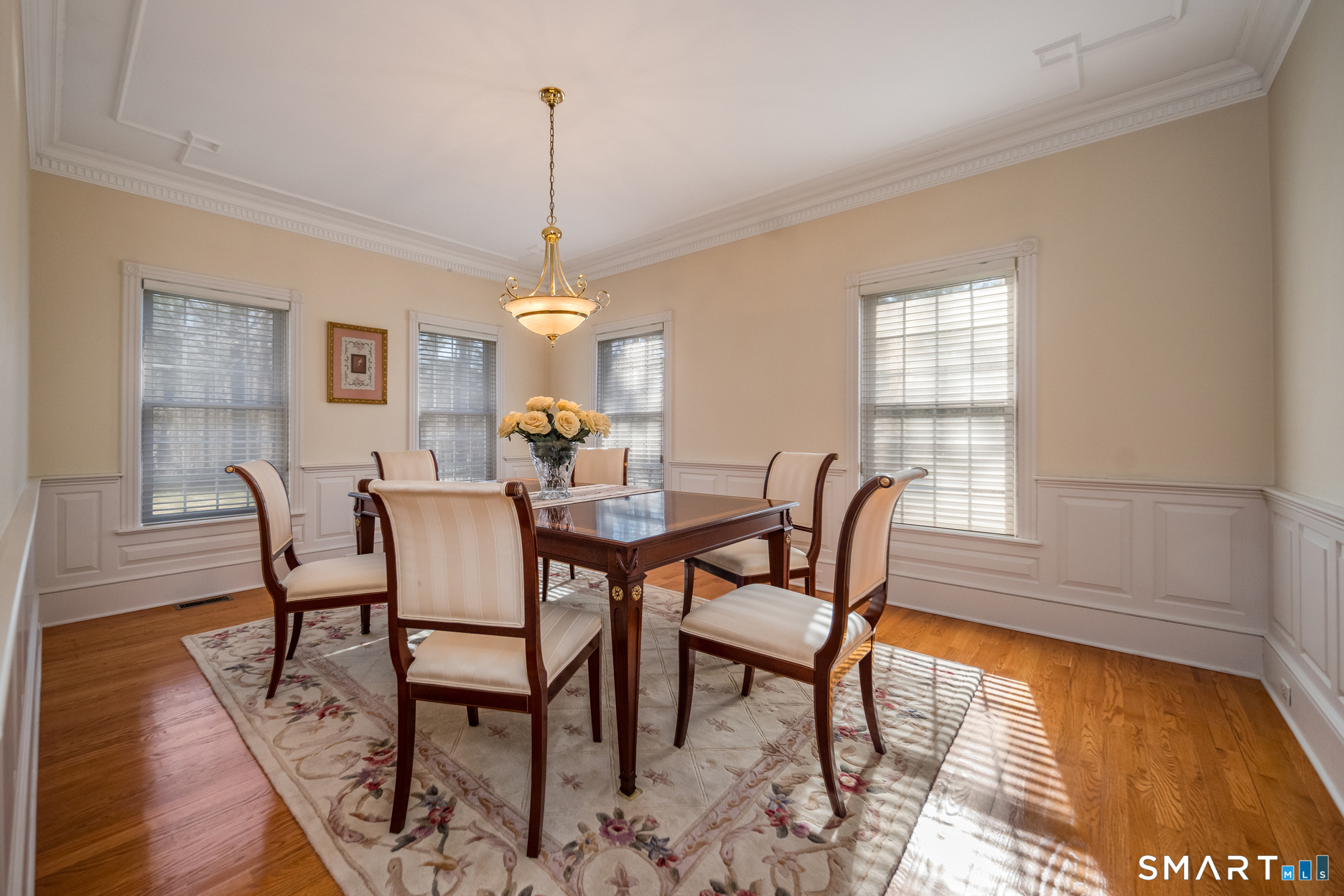 11 Kachina Way Madison, CT 06443 - Photo 9 of 40 a view of a dining room with furniture window and wooden floor