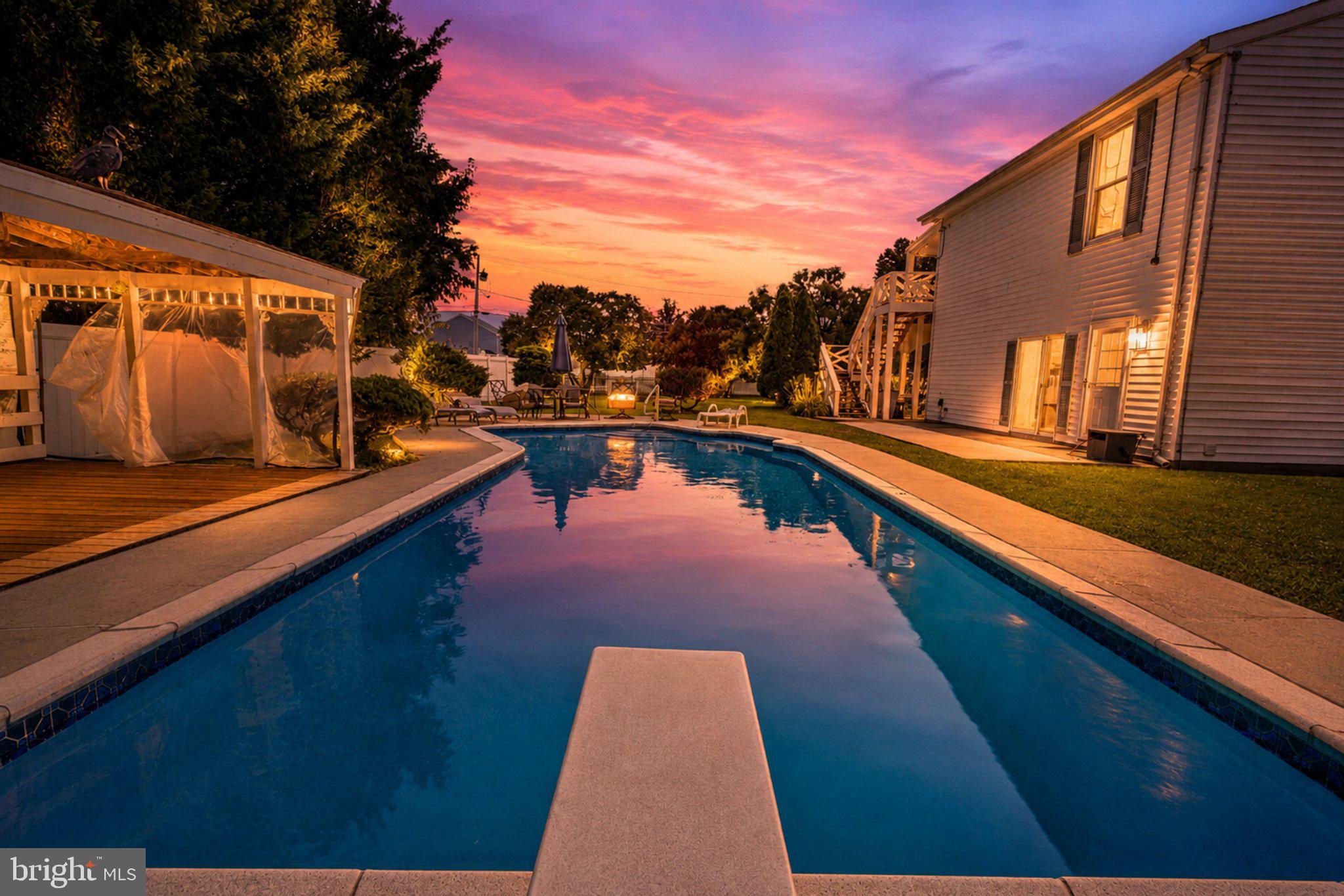 2858 Lodge Farm Road Baltimore, MD 21219 - Photo 2 of 49 Tranquil sunset by the poolside.