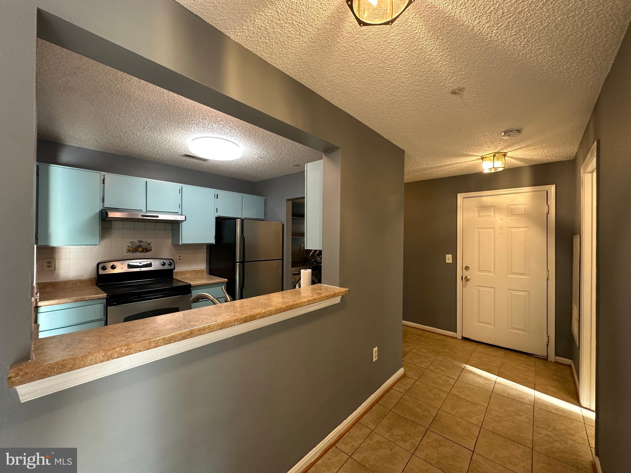 12907 Churchill Ridge Circle, Unit 7 Germantown, MD 20874 - Photo 18 of 26 Foyer With Open Kitchen View