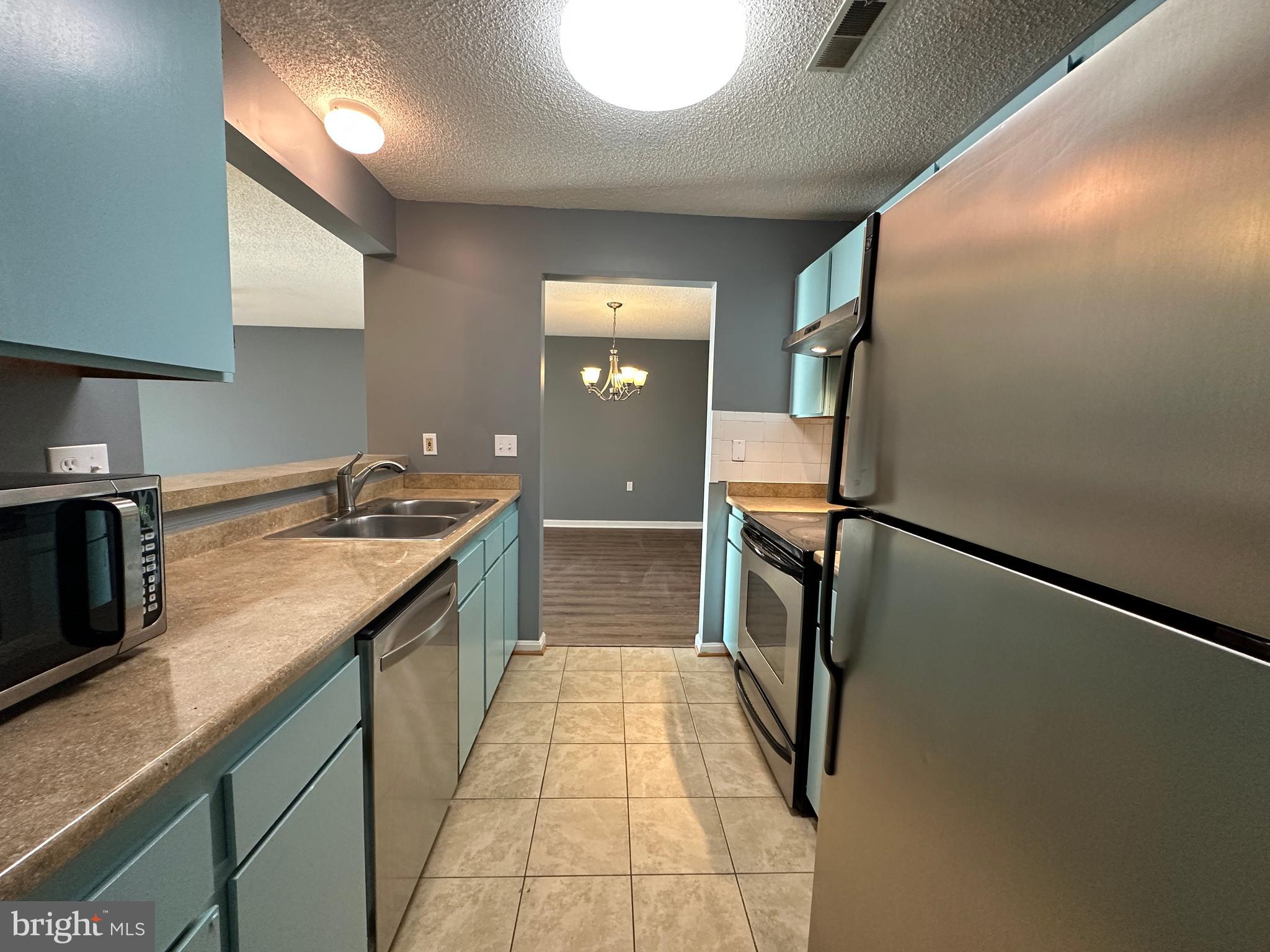 12907 Churchill Ridge Circle, Unit 7 Germantown, MD 20874 - Photo 19 of 26 Kitchen - Steel Appliances