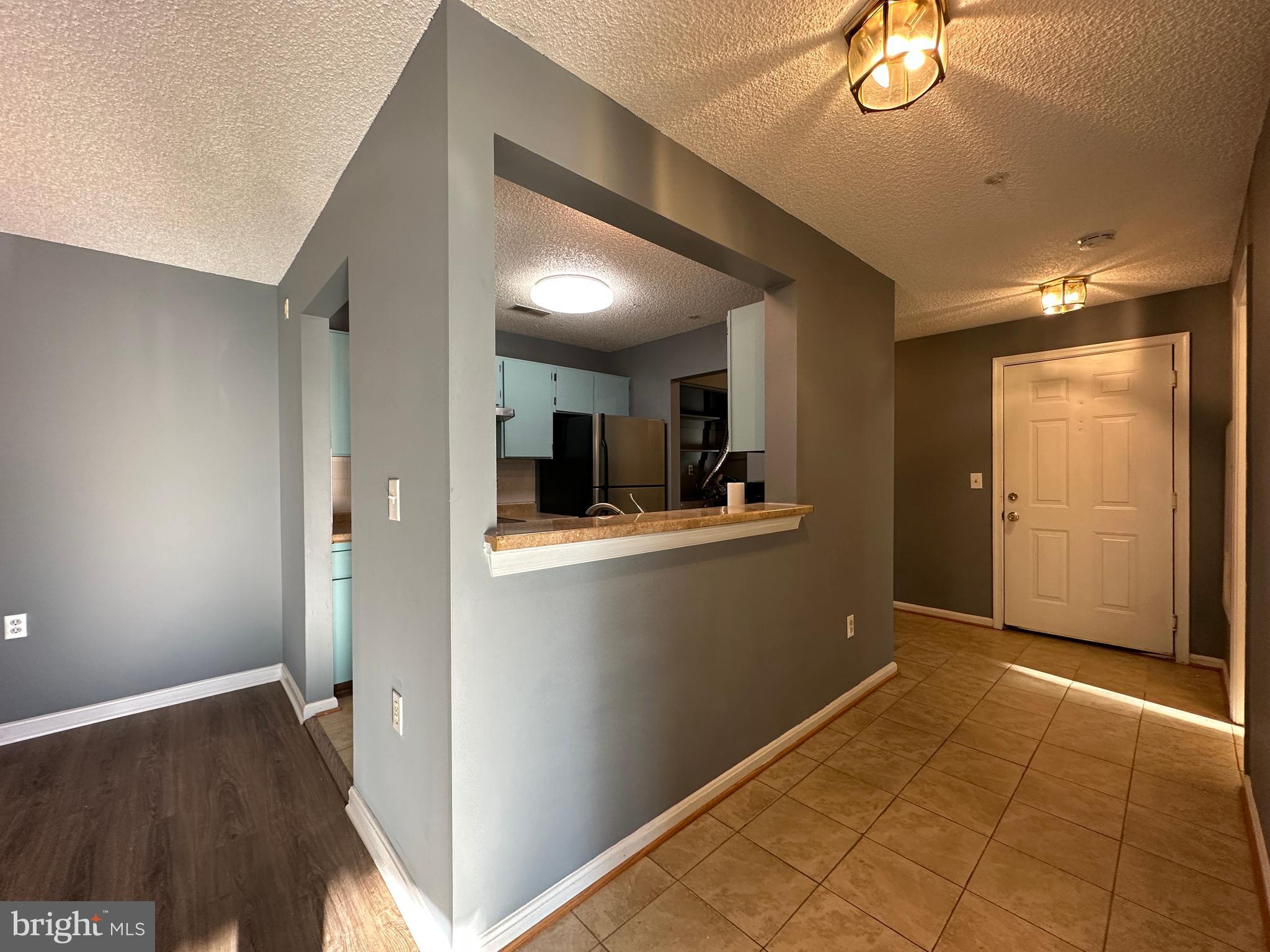 12907 Churchill Ridge Circle, Unit 7 Germantown, MD 20874 - Photo 2 of 26 Foyer With Open Kitchen View