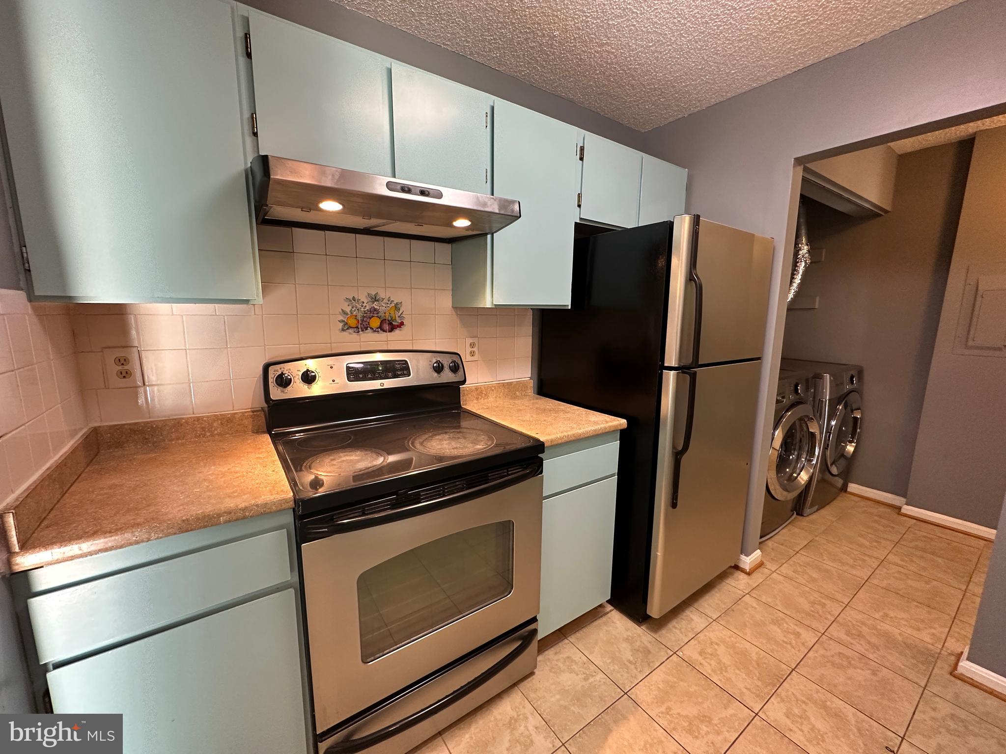 12907 Churchill Ridge Circle, Unit 7 Germantown, MD 20874 - Photo 21 of 26 Kitchen - Stainless Steel Appliances
