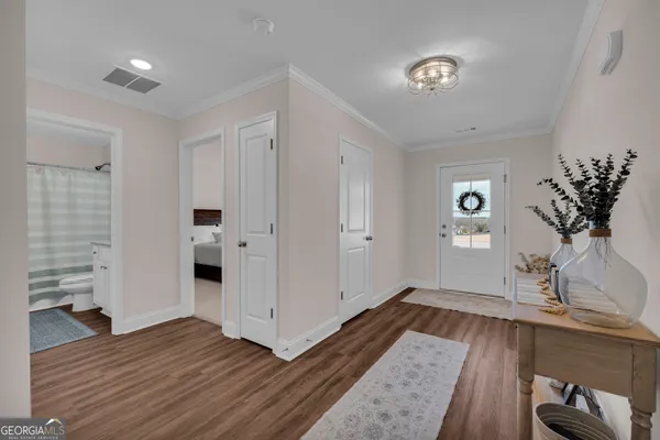 a kitchen with stainless steel appliances granite countertop a sink stove and microwave