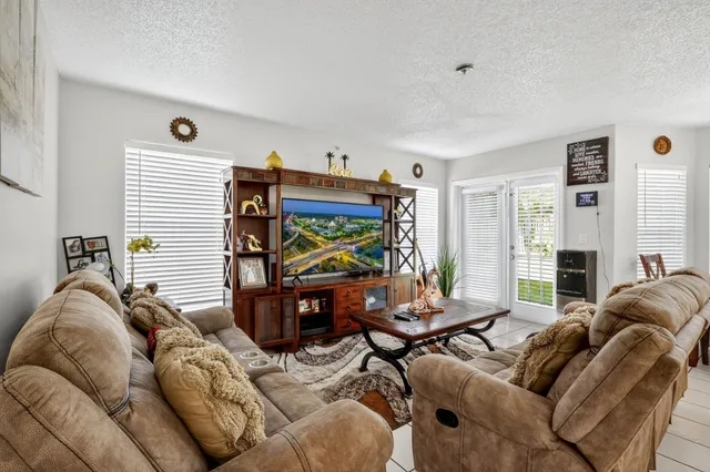 a bathroom with a toilet sink and a window