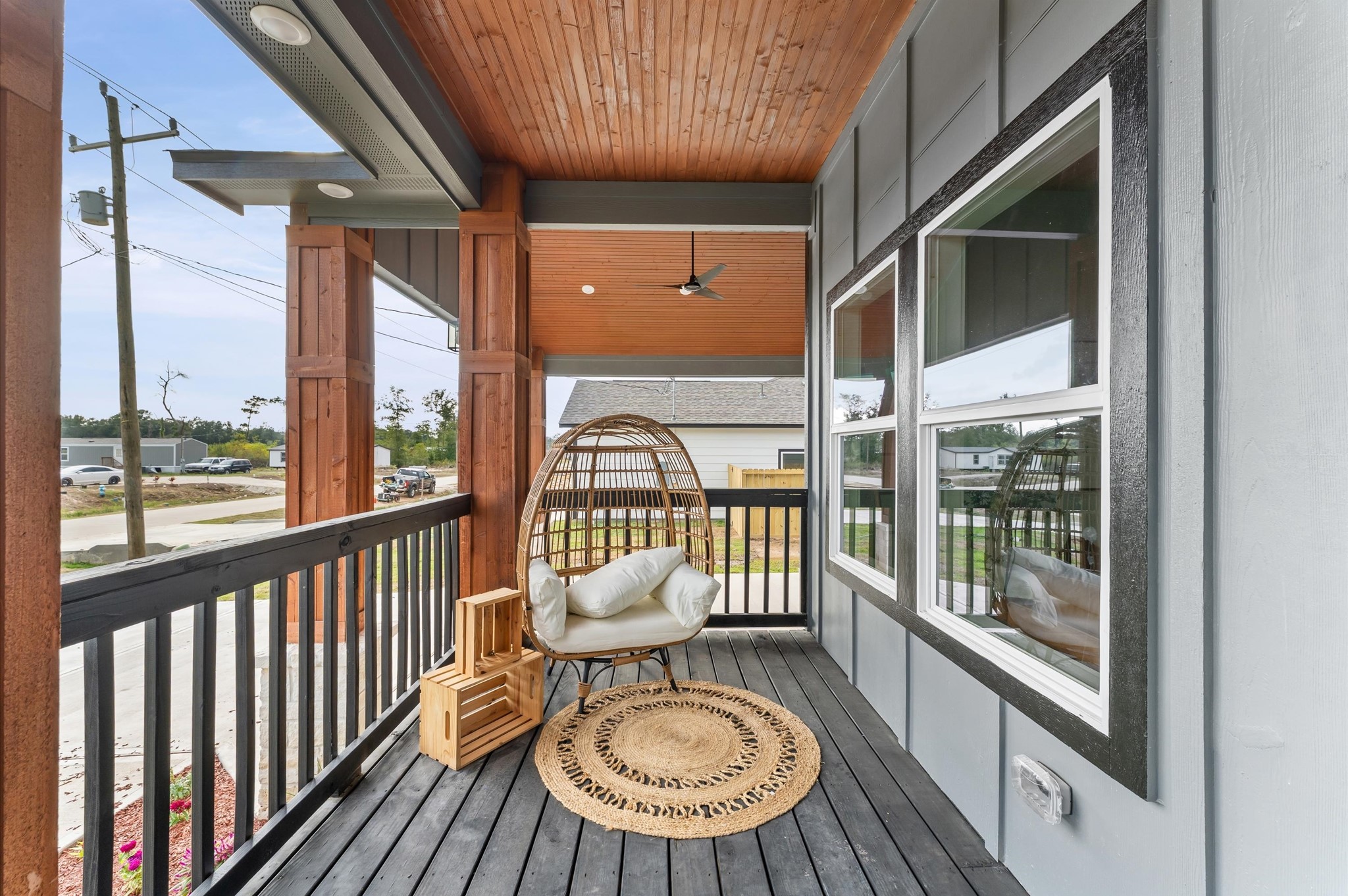 1133 Longleaf Pne Street Huffman, TX 77336 - Photo 5 of 25 Large covered front porch with wood accents and LED lighting.