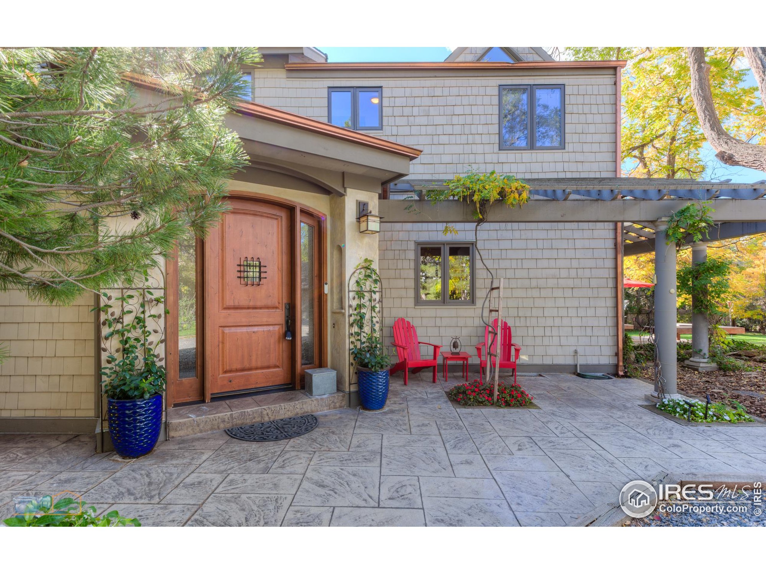 3737 26th Street Boulder, CO 80304 - Photo 23 of 47 a backyard of a house with seating space